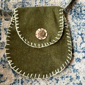 Handmade, small purse and good condition.